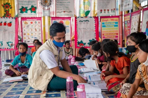 Rohingya and Bangladeshi teachers pair up to tackle education hurdles in camps
